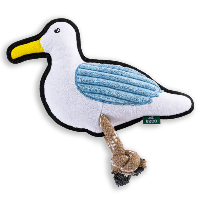 Seagull-shaped toy with a rope tail on a white background