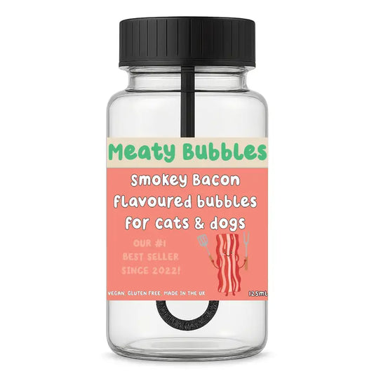 Clear jar with black lid labeled 'Meaty Bubbles Smokey Bacon Flavoured bubbles for cats & dogs' on a white background