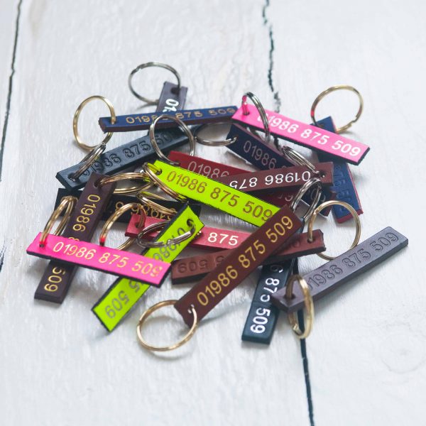 Personalised leather id tags embossed with your contact number
