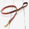 Personalised tan leather dog lead embossed with dog's name