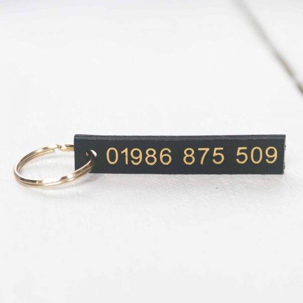Personalised black leather key fob embossed phone number gold