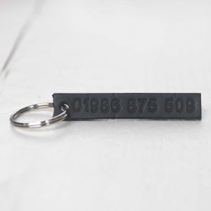 Personalised black leather key fob embossed phone number plain
