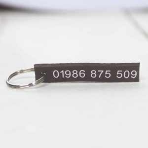 Personalised black leather key fob embossed phone number silver