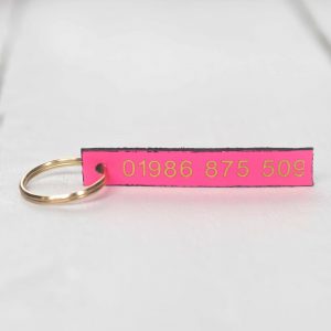 Personalised neon pink leather key fob embossed phone number gold