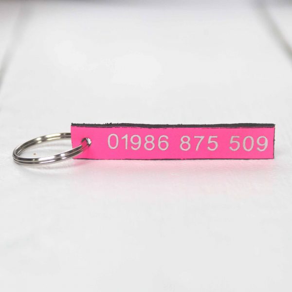 Personalised neon pink leather key fob embossed phone number silver